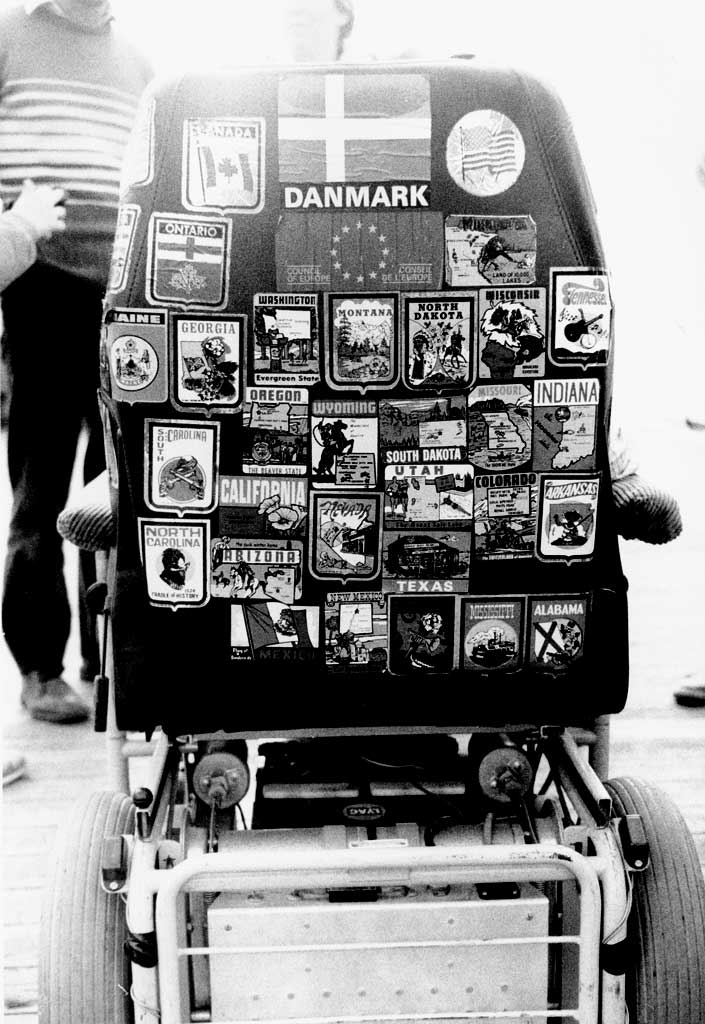 Stickers of the back of the wheelchair after the Canada and USA trip