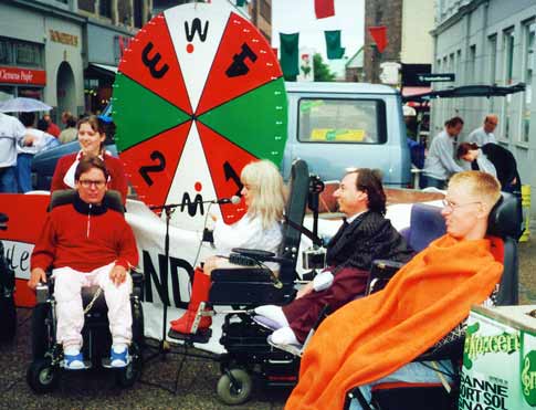 Here is almost the whole team, with the big wheel of swindle in the background